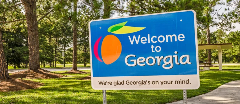 welcome to georgia sign off of the road