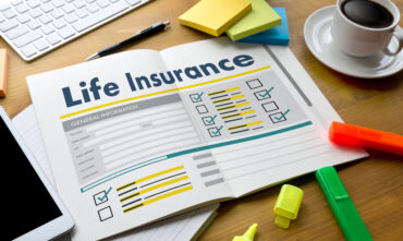 life insurance paperwork on desk