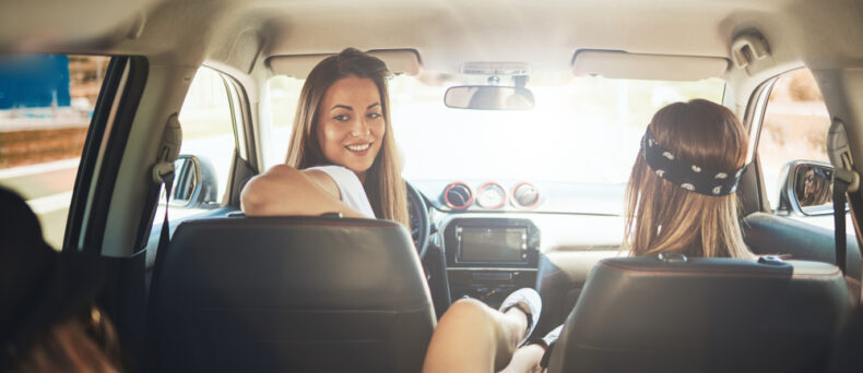 Three woman get ready for a spring road trip in Georgia.