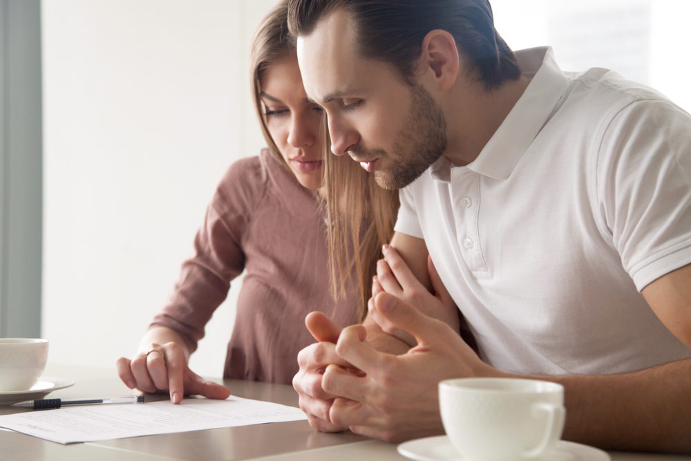 couple looking over documents