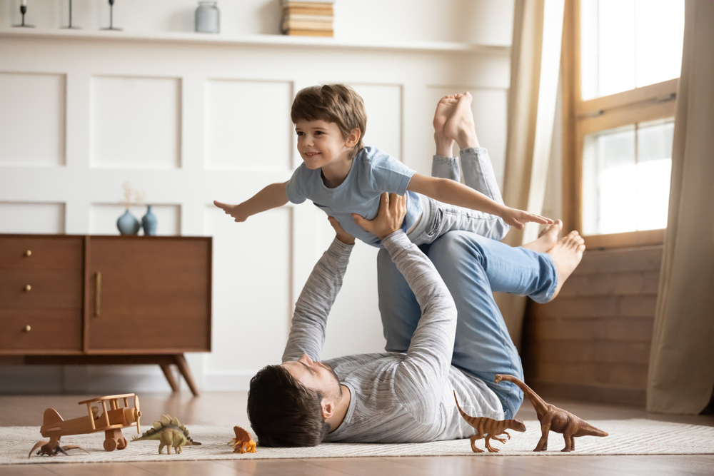 father playing with son