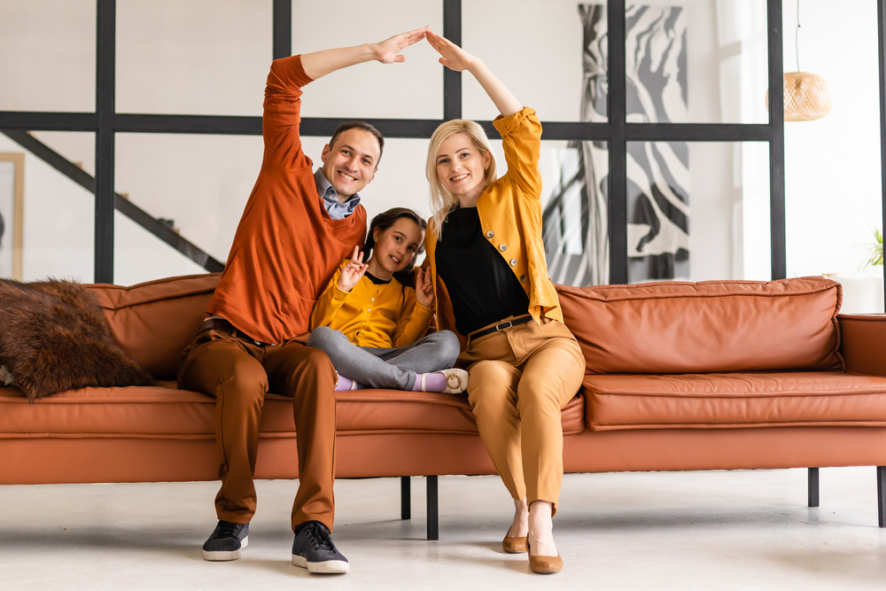 family sitting on couch