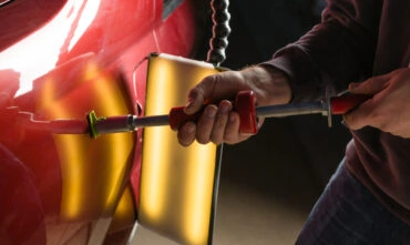car getting paintless dent repair done