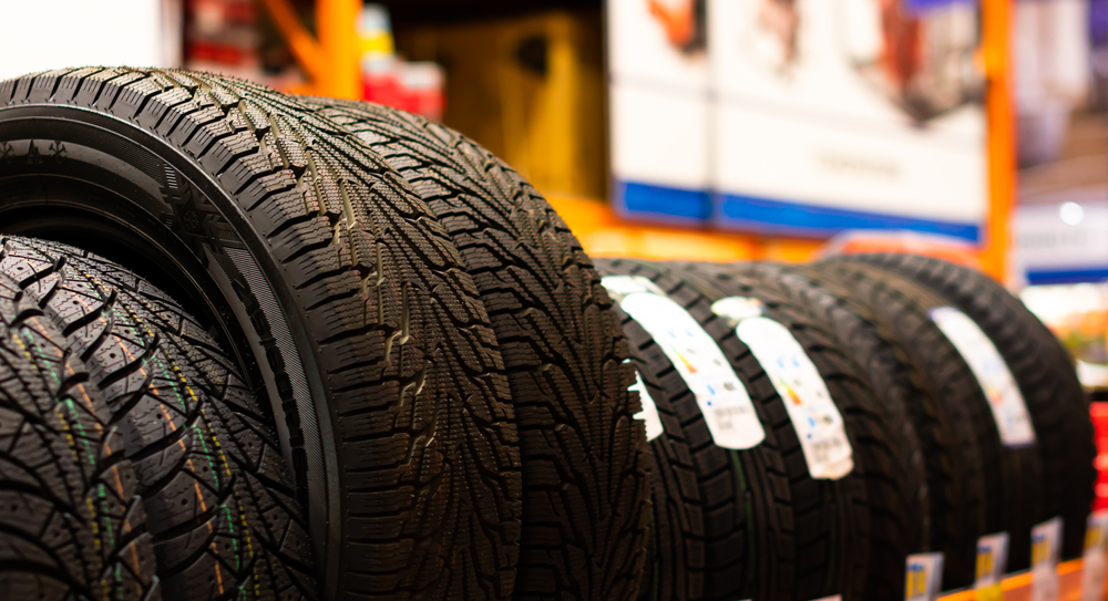 rack of tires at a tire store