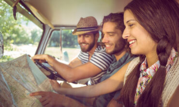 Group of friends in a car on a day trip in georgia