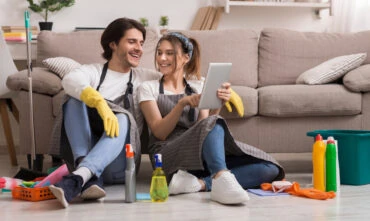 Couple checks their home insurance as part of spring cleaning