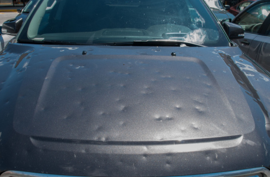 hail-dented car