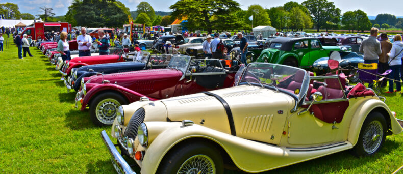 line of classic cars at a car show