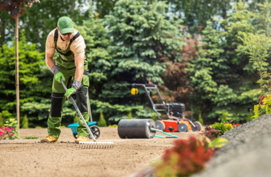 Gardener grooming the landscape