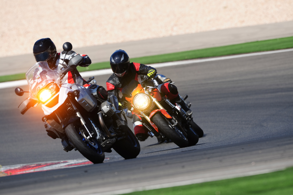 two motorcycles racing