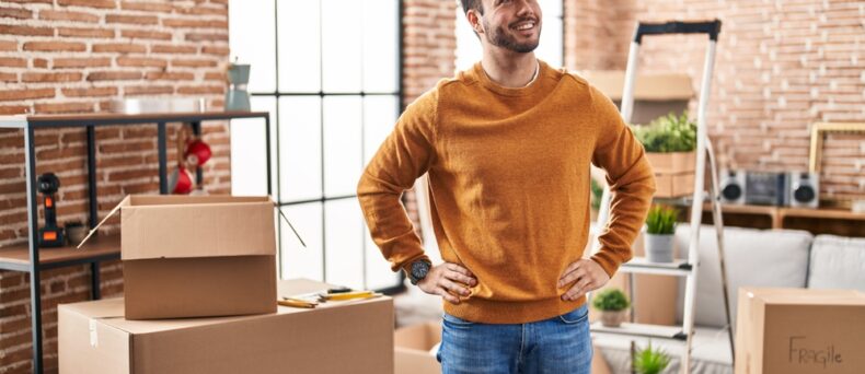 Young male looks around his new apartment in Atlanta
