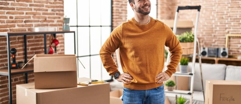 Young male looks around his new apartment in Atlanta