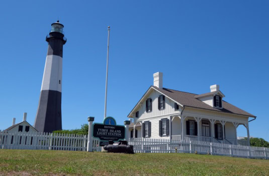 Tybee island lighthouse, on savannah's beach, georgia, touristic destination in oceanside, architectural interest on a sunny day.
