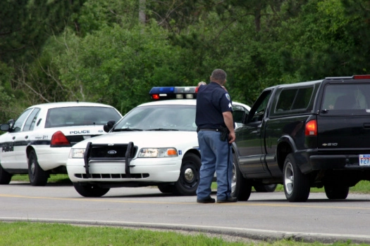 Police cars block speeding car - cheap car insurance in Georgia