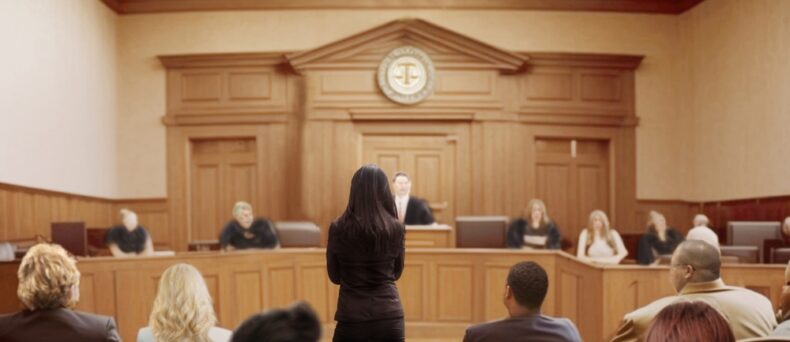 People from behind in a court room - cheap DUI insurance in Georgia.