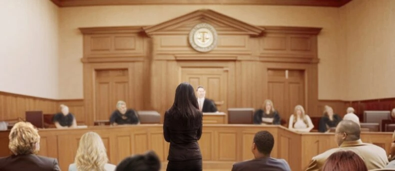 People from behind in a court room - cheap DUI insurance in Georgia.