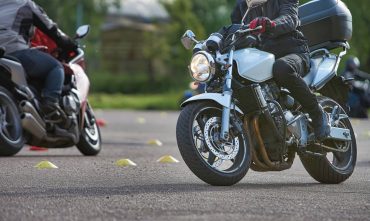 Motorcyclists practicing safety maneuvers during a motorcycle training course in Georgia.