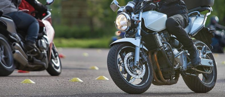 Motorcyclists practicing safety maneuvers during a motorcycle training course in Georgia.