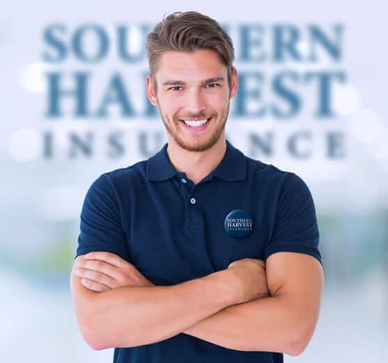 Portrait of smiling male southern harvest agent with brand logo in the brackground