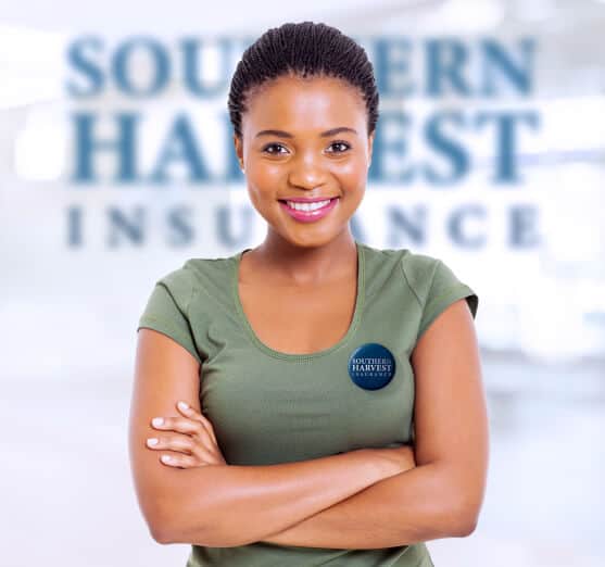 Smiling african american southern harvest insurance agent looking at the camera