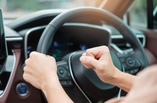 Woman honking horn in road rage incident - cheap car insurance in Georgia