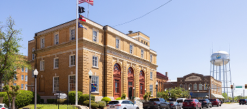 Americus, Georgia, USA - April 19, 2022: The Sumter County Courthouse and it is Veterans Memorial.