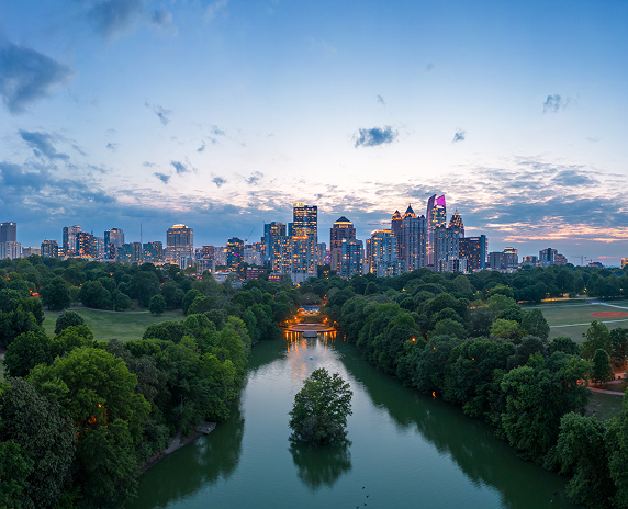 Atlanta overlooking Piedmont Park at dusk – cheap car insurance in Georgia.