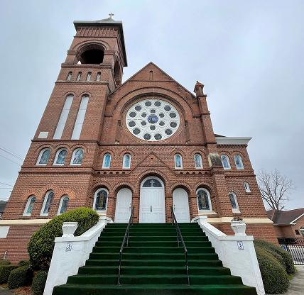 Thankful Baptist Church looking up green carpet steps to entrance - cheap car insurance in Georgia.