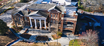 Aerial panoramic view of Duluth City Hall and Town Greene in downtown Duluth - cheap car insurance in Georgia.