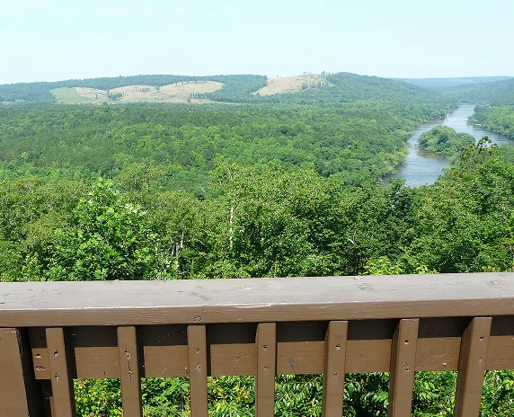 Roadside overlook at Sprewell Bluff Park near Thomaston, Georgia, provides a view of the free-flowing Flint River in soft background.