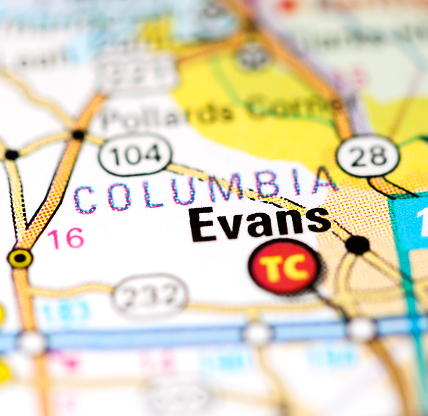 A close-up map highlighting Evans, Georgia, near Columbia, with major highways and surrounding towns providing regional location context.