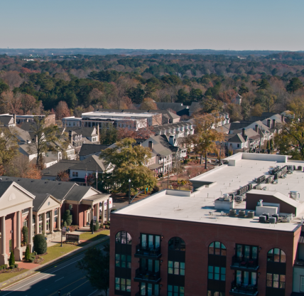 Aerial landscape of Norcross residential area sunny summer day in Bryan County Georgia USA. Cheap car insurance in Georgia.
