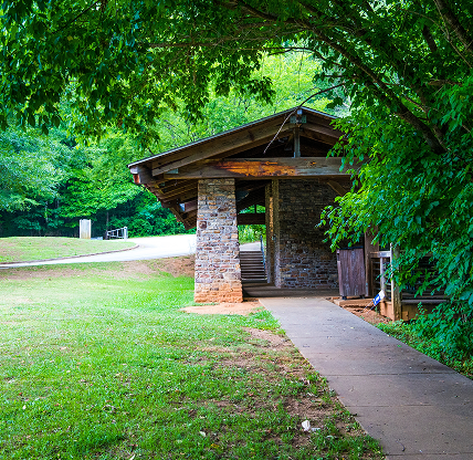 Park surrounded by lush green trees and grass at Heritage park in Smyrna Georgia - Cheap car insurance in Smyrna, Georgia.